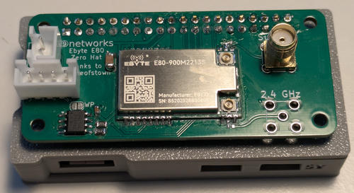Picture of the hat on top of a Pi Zero, showing the radio module and two antenna connectors for Sub-GHz and 2.4GHz.